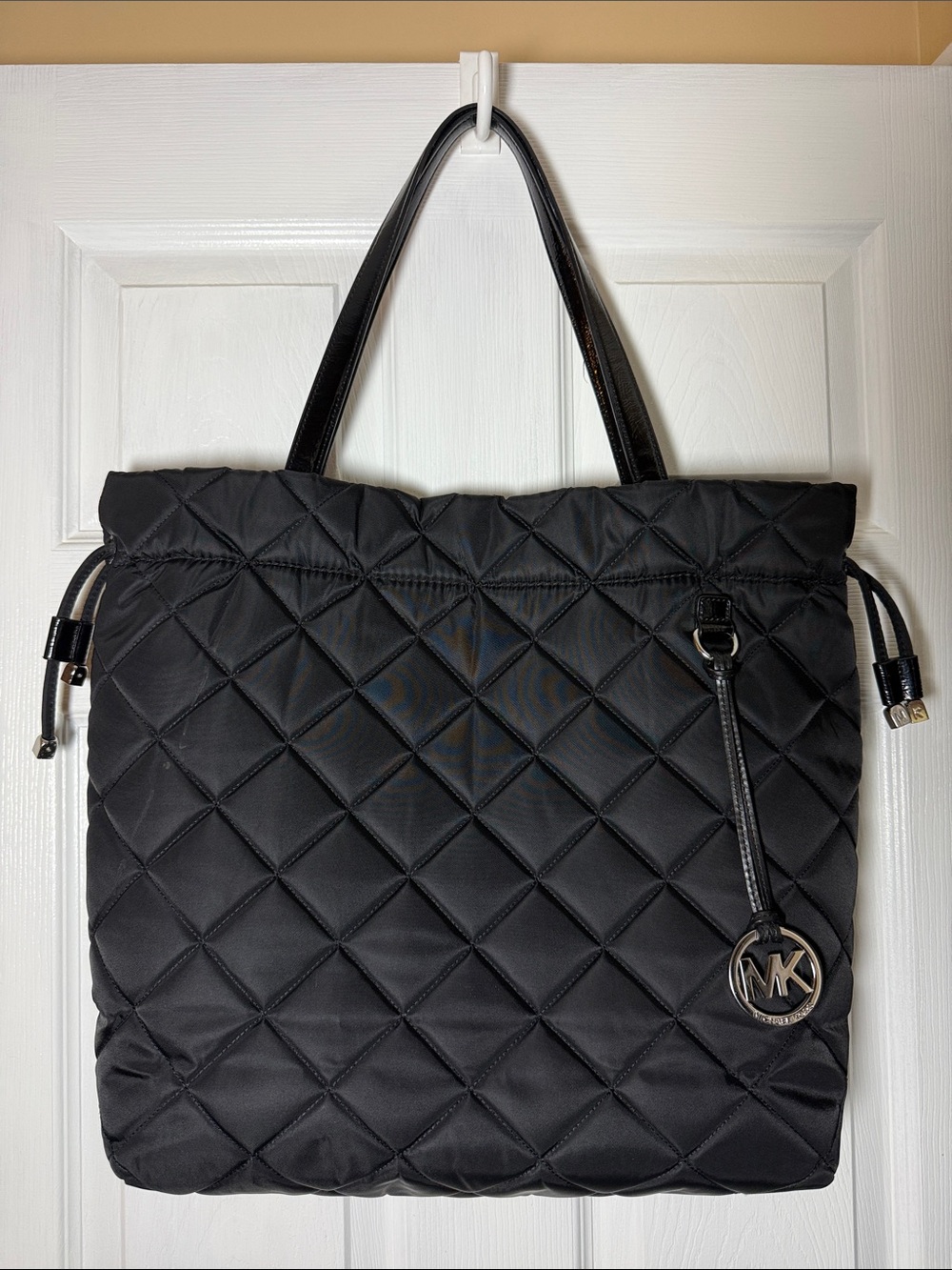 Michael Kors Black Quilted Nylon Tote with MK Charm Accent